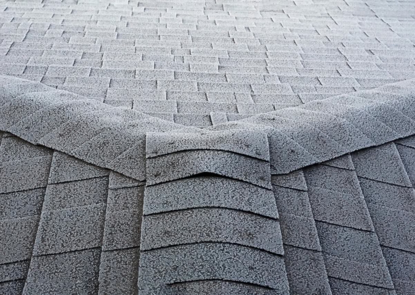 A frosty Wisconsin roof with asphalt shingles