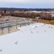 Ariel view of a metal commercial roof being installed