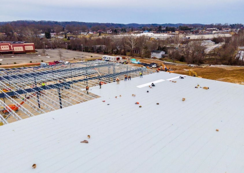 Ariel view of a metal commercial roof being installed