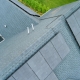 Light colored roof shingles with solar panels