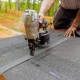 Roofer installing a new roof