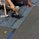 Roofer installing shingles in Dane County