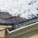 Damaged roof covered in hail