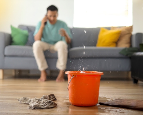 Roofing contractor performing same day residential roof repair after storm