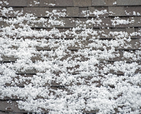 Hail damage roof repair needed on Madison home after severe storm in Dane County