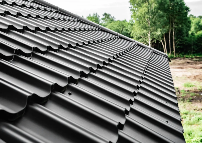 View of house highlighting metal roof benefits in Madison landscape