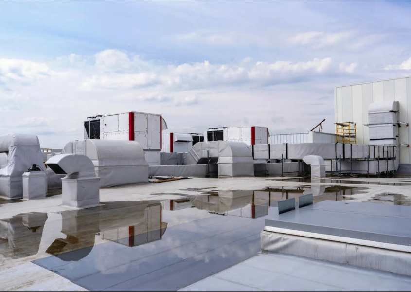 Flat roof ponding water and drainage issues requiring flat roof risk management attention