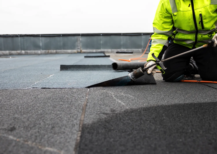 Flat roof repair for commercial roof after budget planning assessment